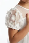 vestito elegante bambina crema, abito tulle bambina fiori 3D, vestito comunione bambina, vestito battesimo bambina, abito romy zoya fashion, moda bambini italia