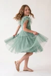 dettaglio tulle e cintura abito verde menta