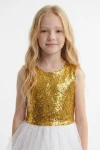 Abito Riva bianco e oro senza maniche – corpetto di paillettes e tulle bianco, vista frontale fino alla vita
