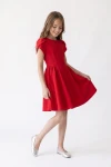 Abito Rumi rosso – bambina che allarga la gonna svasata, figura intera