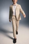 Completo Liam beige – pantaloni e giacca aperta in movimento, vista frontale